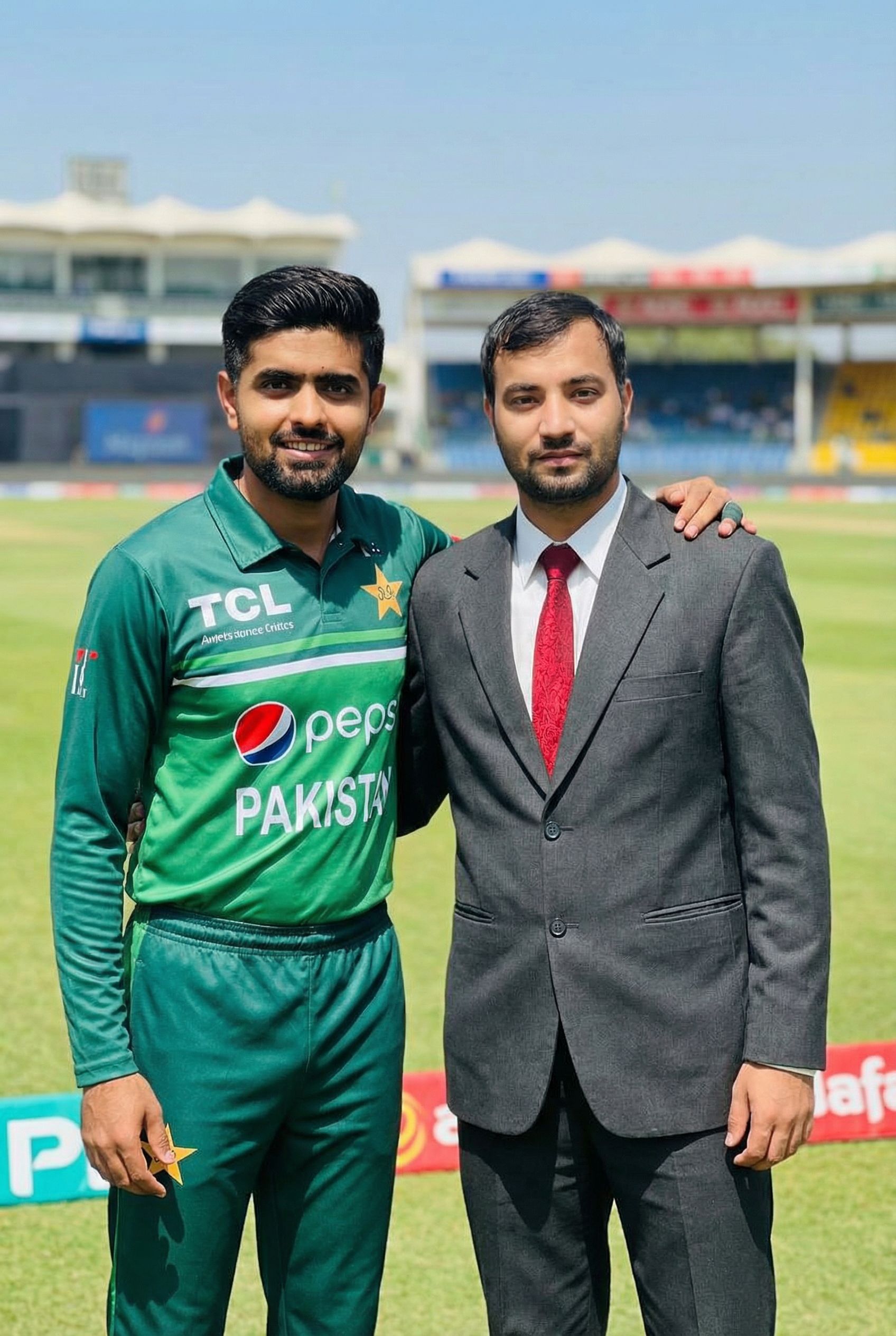 Nano Banana prompt: Add an image of Baber Azam standing n...